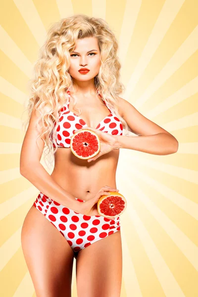 Bikini a grapefruit. — Stock fotografie