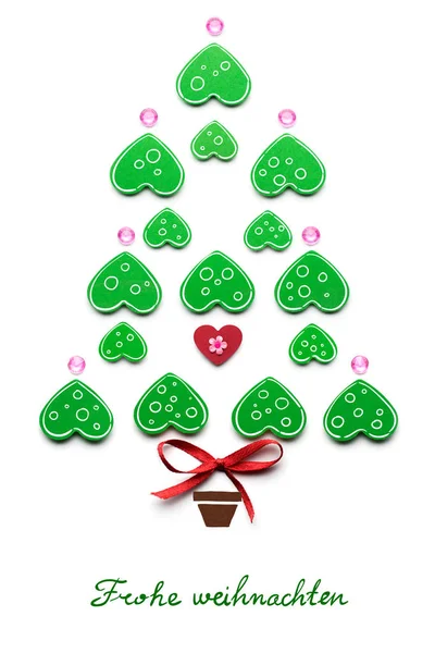 Magic tree. Creative concept photo of christmas tree with heart made of paper on white background. Frohe Weihnachten. — Stock Image Magic tree. Creative concept photo of christmas tree with heart made of paper on white background. Frohe Weihnachten. Stock Image