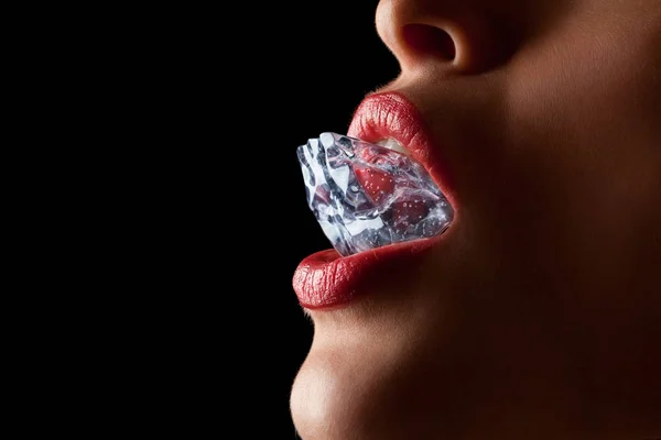 Ice cube in woman's mouth. — Stock Photo, Image