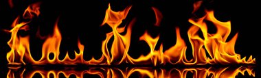 Fire on a black background. clipart