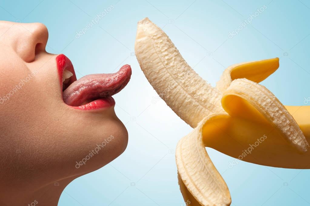 woman licking banana