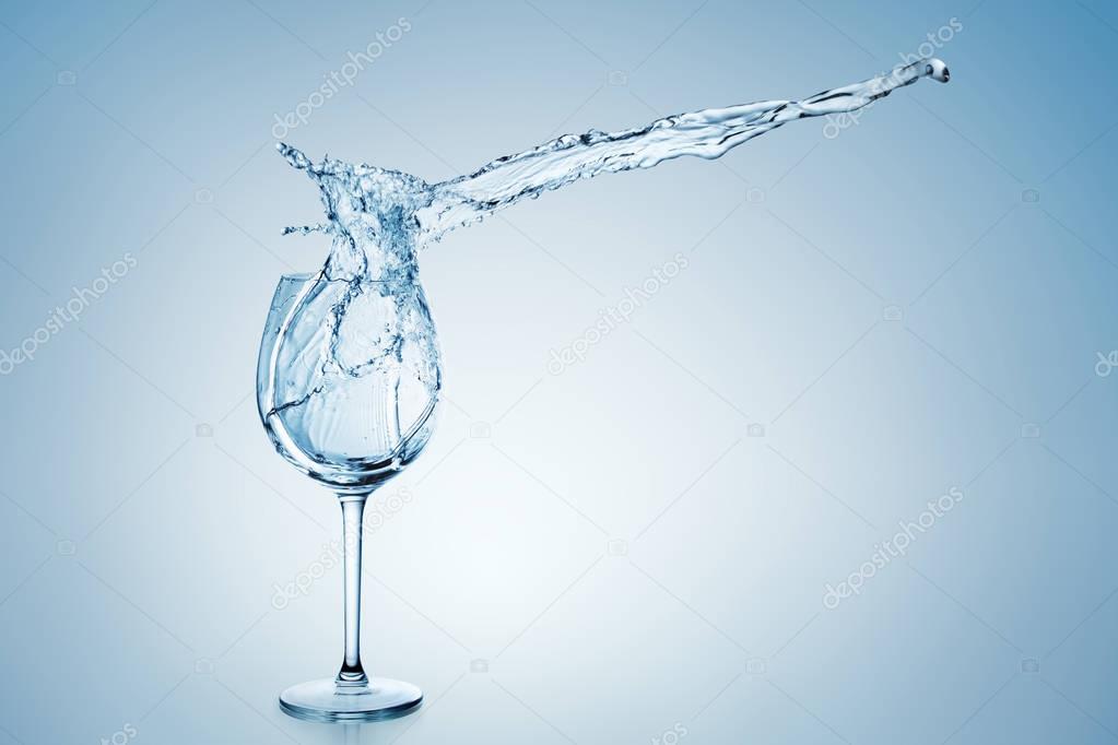Water Splash in Wine Glass. 