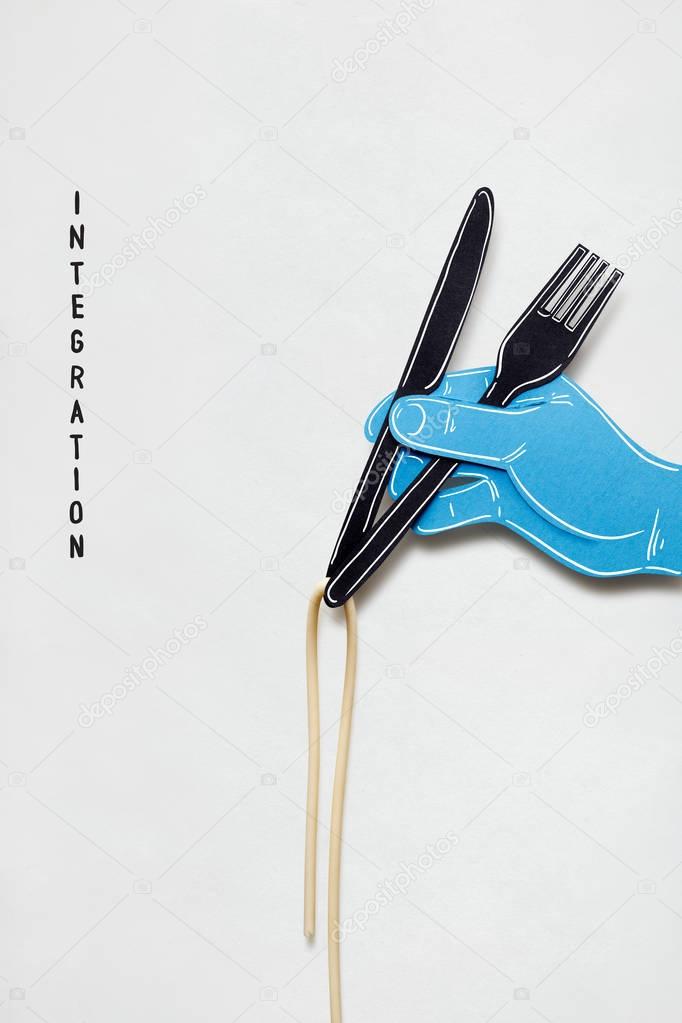 Hand with fork knife and pasta