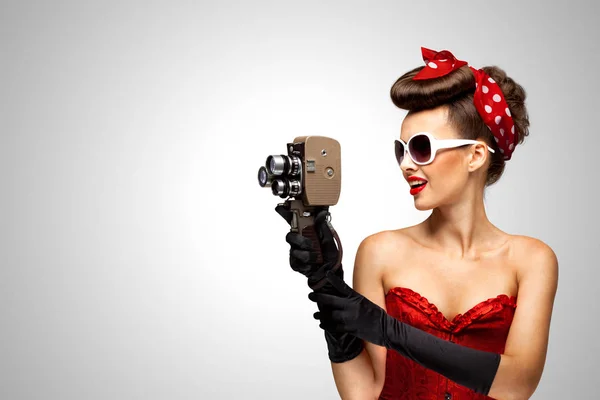 Girl with an old vintage camera — Stock Photo, Image