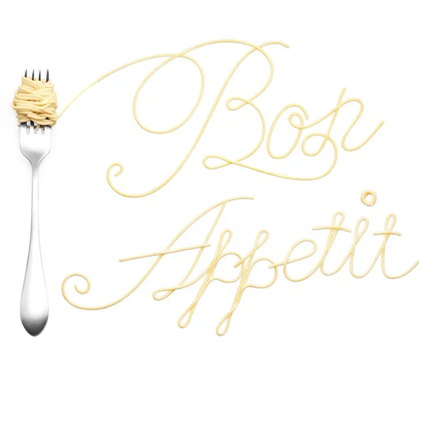 Pasta. Creative still life photo of a fork with a sign made of pasta isolated on white background. — Stock Photo, Image