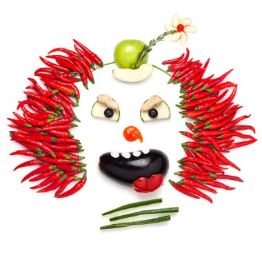 ürpertici halloween palyaço chilli biber ve diğer sebze yardımı ile gösteren bir yaratıcı yiyecekler kavramı.