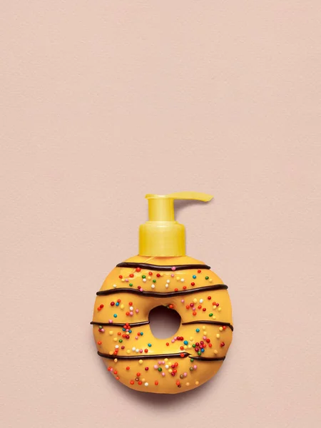 Creative Still Life Tasty Sweet Yellow Donut Cosmetic Pump Dispenser — Stock Photo, Image