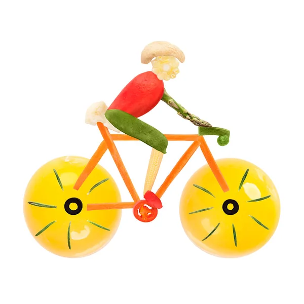Gyümölcs Zöldség Alakja Egy Férfi Kerékpáros Egy Országúti Kerékpár — Stock Fotó