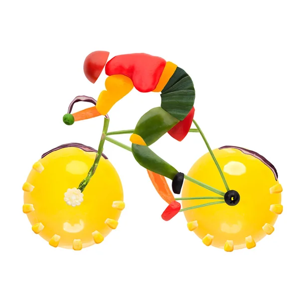 Obst Und Gemüse Form Eines Männlichen Radfahrers Auf Einem Rennrad — Stockfoto