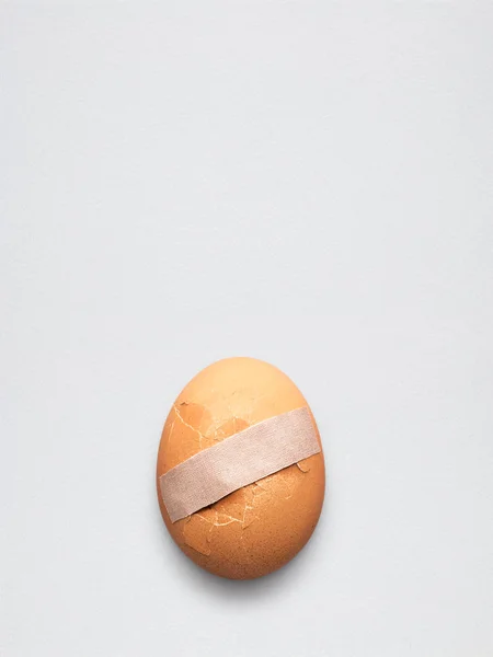 Creative Medicine Healthcare Concept Sticking Plaster Cracked Broken Egg — Stock Photo, Image