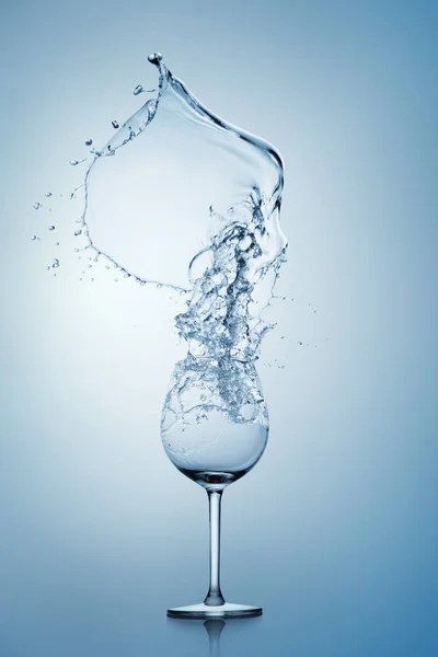 Water Splashing Out Tall Wine Glass — Stock Photo, Image