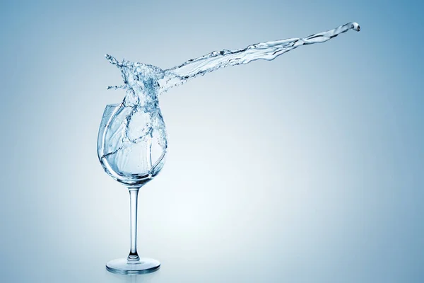 Water Splashing Out Tall Wine Glass — Stock Photo, Image