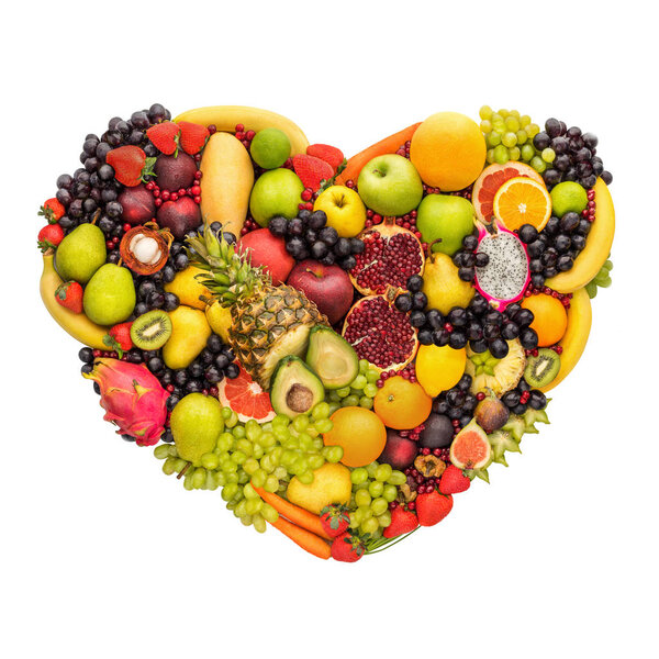 Health concept of eating smart; heart symbol made of fresh fruits that reduce death risk, isolated on white background.