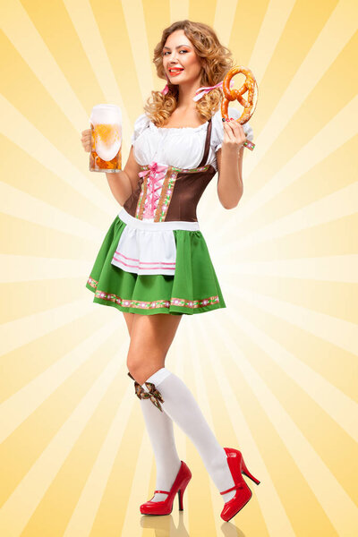 Beautiful sexy Oktoberfest woman wearing a traditional Bavarian dress dirndl holding a pretzel and beer mug in hands on colorful abstract cartoon style background.