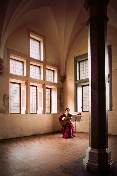 Woman Playing Guitar While Sitting Large Open Room Malbork Castle — Stock Photo, Image