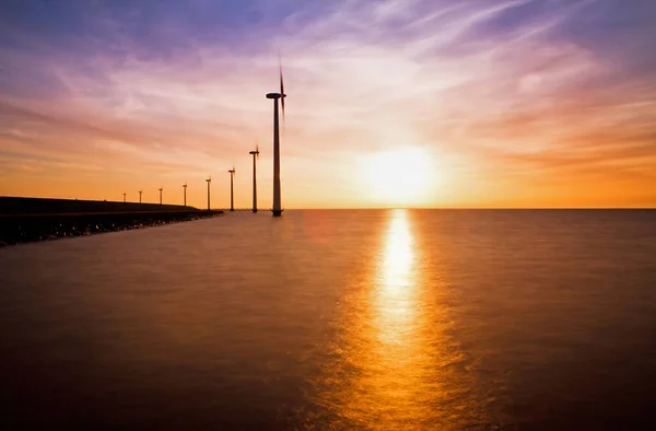 Blue sunset turbines scenic view
