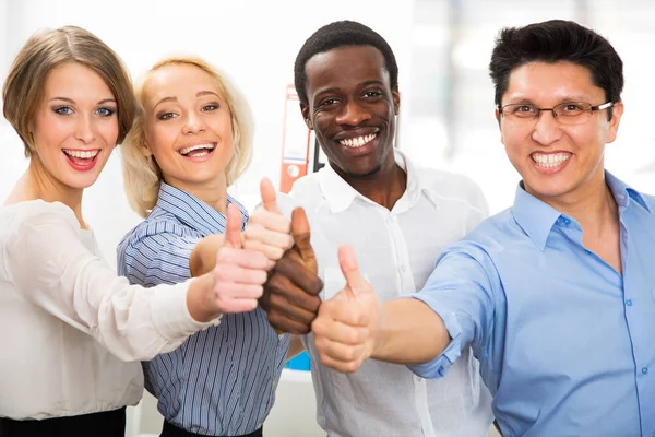 Business people with thumbs up — Stock Photo, Image