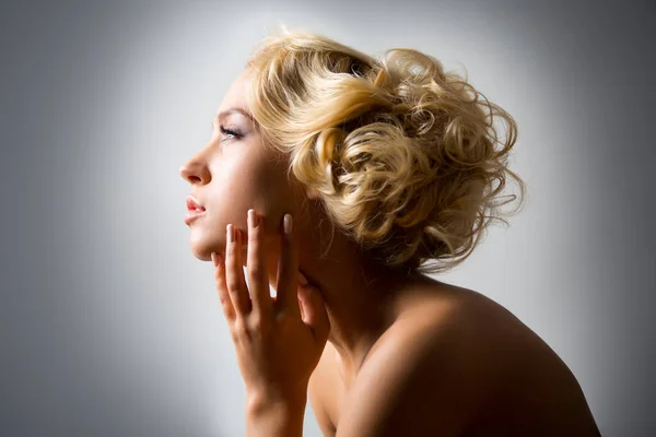 Blonde woman with fashion hairstyle — Stock Photo, Image