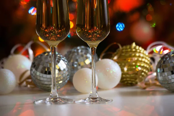 Hampagne glasses and christmas balls — Stock Photo, Image