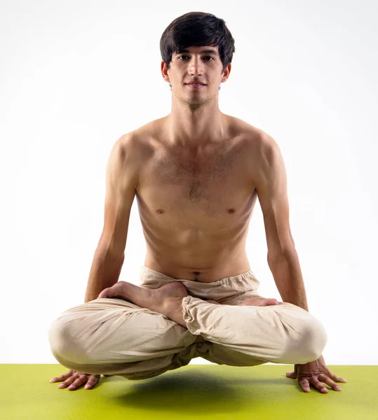 Young man doing yoga — Stock Photo, Image