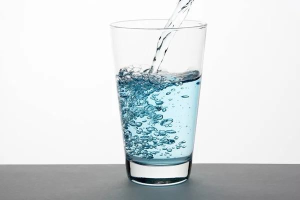 Blue water in a glass — Stock Photo, Image