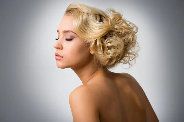 Blonde woman with fashion hairstyle — Stock Photo, Image