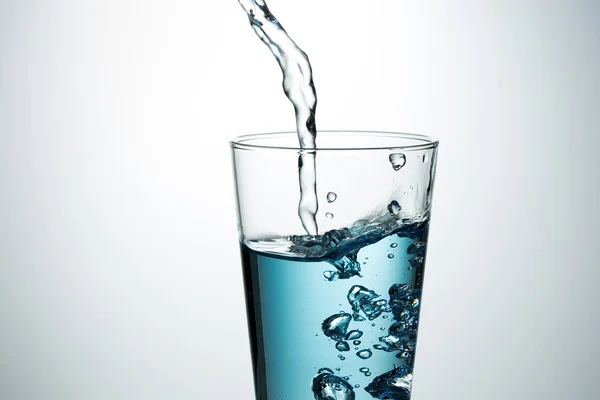 Blue water in a glass — Stock Photo, Image