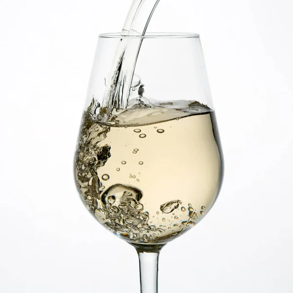 Beautiful splash of wine in a glass — Stock Photo, Image