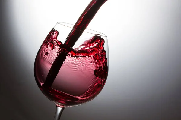 Сплеск червоного вина — стокове фото