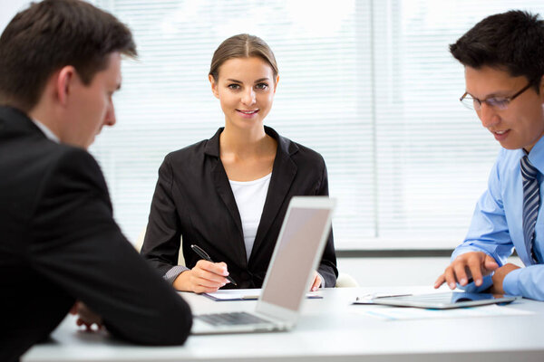 Young business people working in an office