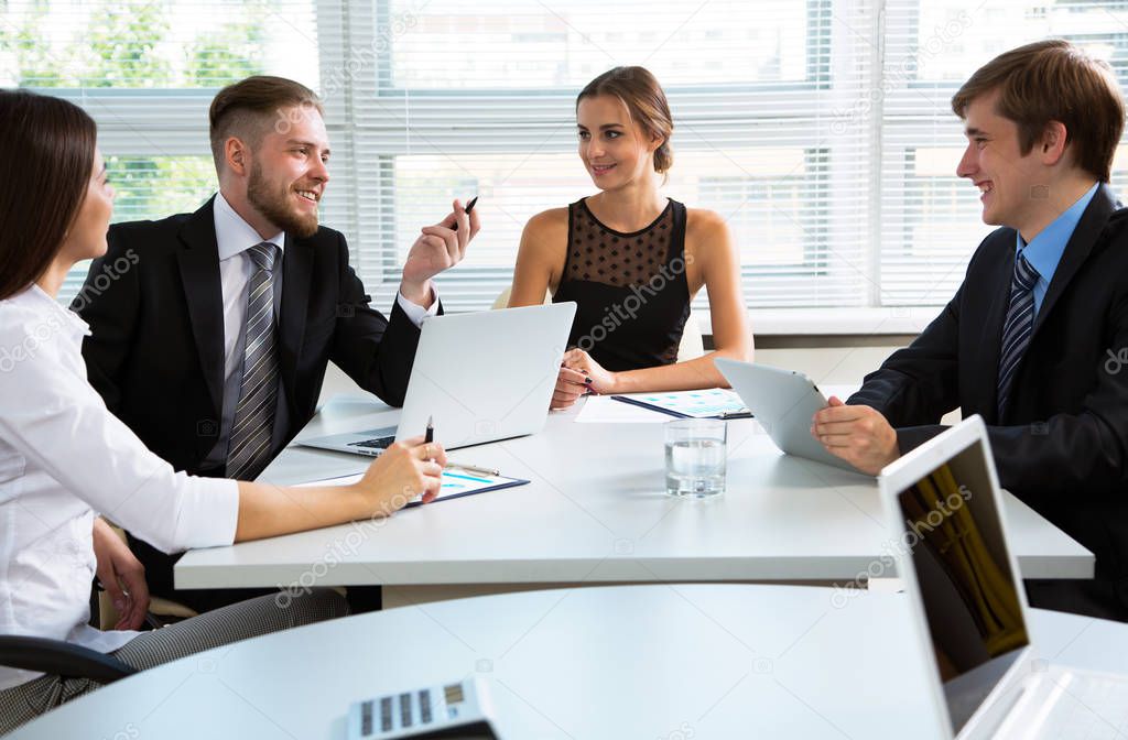  business people in a meeting