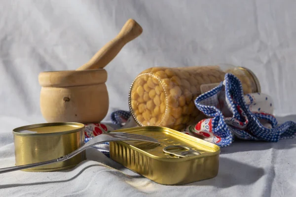 Still life composition of tinned food cans ideal kit to survive in a confinement or quarantine