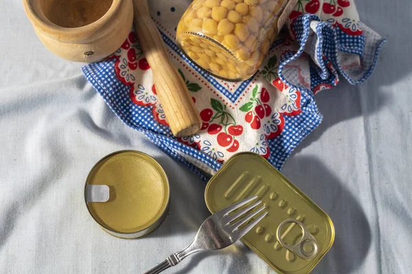 Still life composition of tinned food cans ideal kit to survive in a confinement or quarantine