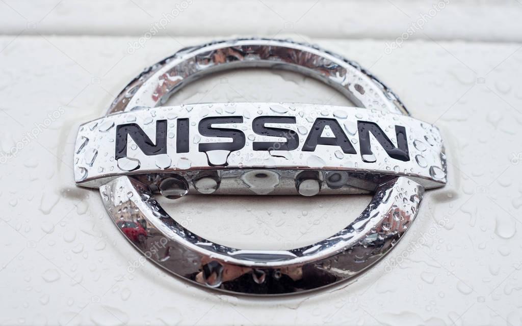 MINSK, BELARUS - november 26, 2017: Nissan logo with raindrops