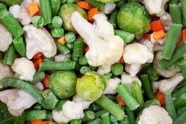 Arka plan olarak farklı donmuş sebzeler, üst görünüm