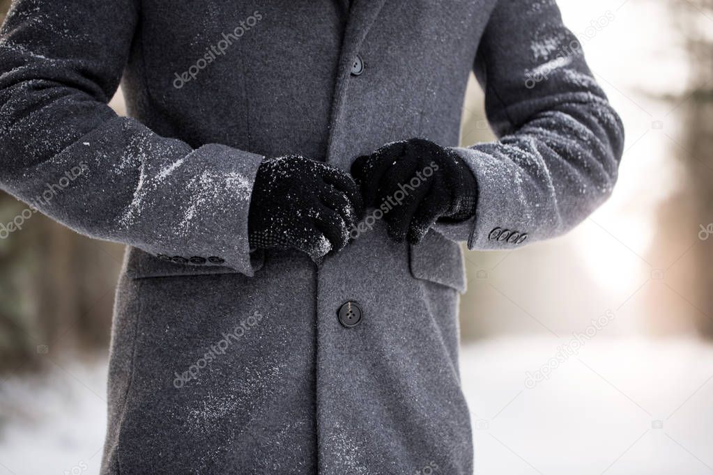 Buttoning winter coat