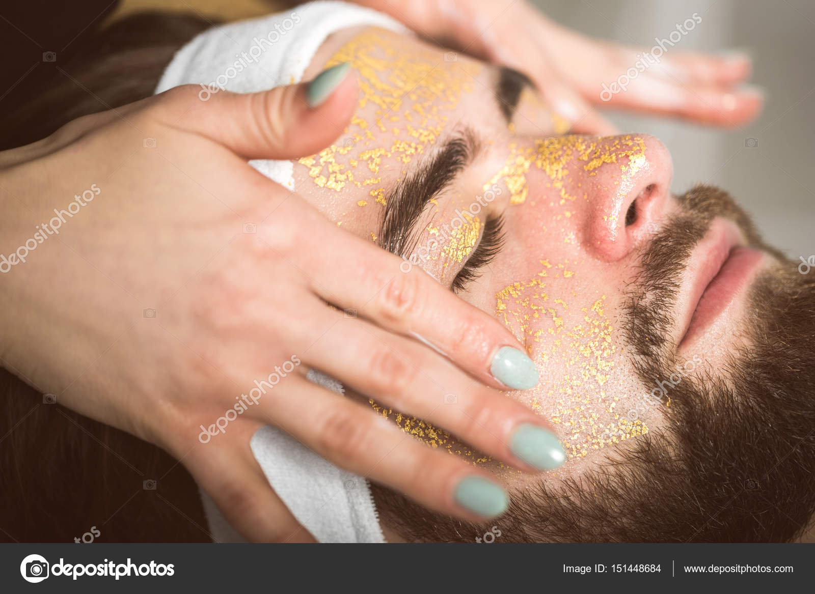 Men S Gold Mask Therapy At Beautician S Stock Photo Men S Gold Mask Therapy At Beautician S Stock Photo