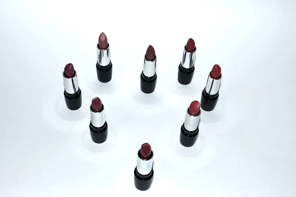 Set Lipsticks Different Colors Stand Form Heart White Background — Stock Photo, Image