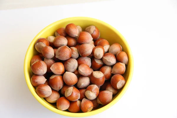 Yellow Bowl Hazelnuts White Background — Stock Photo, Image