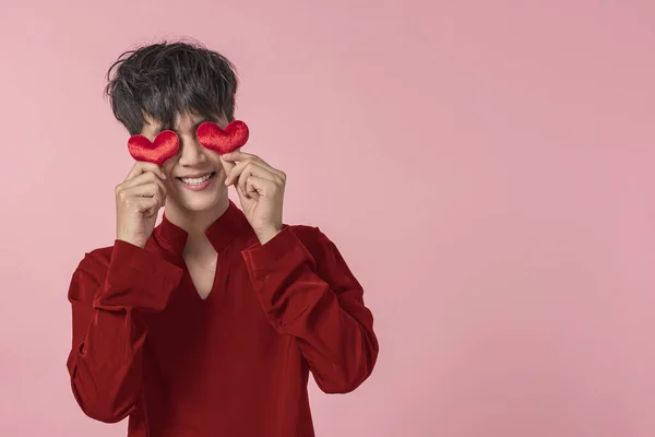 Young Man Red Shirt Holding Red Heart Front Eye Pinky — Stockfoto