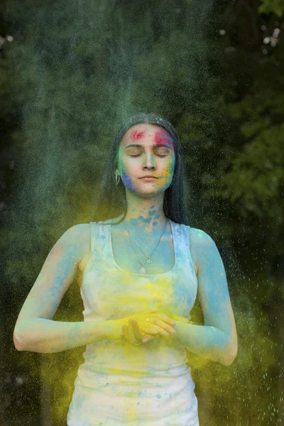 Young model with closed eyes and color paint — Stock Photo, Image