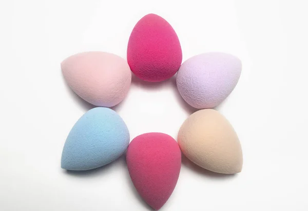 Set of colored beauty blenders on a white background — Stock Photo, Image