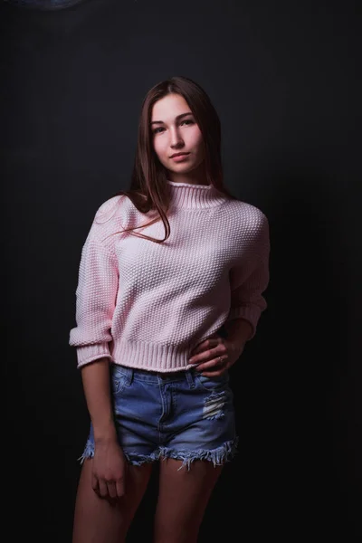 Model test of pretty brunette woman with long hair, wears pink s — Stock Photo, Image