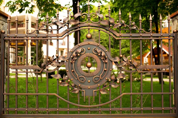Fragment of wrought iron fence gate — Stock Image Fragment of wrought iron fence gate Royalty Free Stock Photos