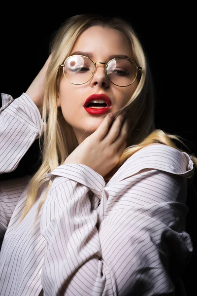 Elegant blonde woman in glasses wearing blouse with naked should — Stock Photo, Image