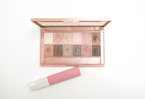 Makeup eyeshadow palette and matt  liquid lipstick — Stock Photo, Image
