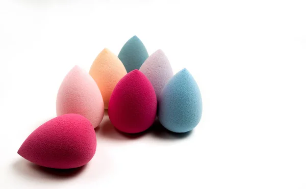 Set of colorful beauty sponges on a white background. Space for — Stock Photo, Image