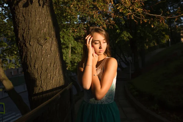 Street portrait of young wonderful lady with closed eyes posing — Stock Photo, Image