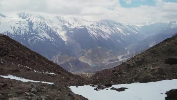 Flight above highland water stream running down to mountain valley, Nepal — Stock Video