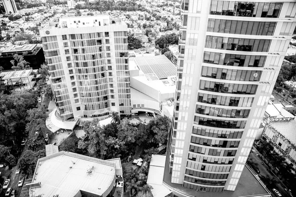 Several tall buildings black and white — Stock Photo, Image